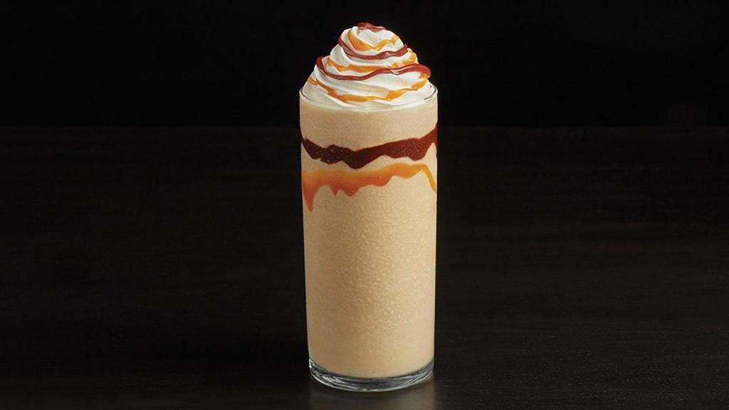 Chocolate & Caramel Swirl Frappé · A rich combination of creamy caramel, rich chocolate, and cold brewed coffee, dolloped with whipped cream and decadently swirled.