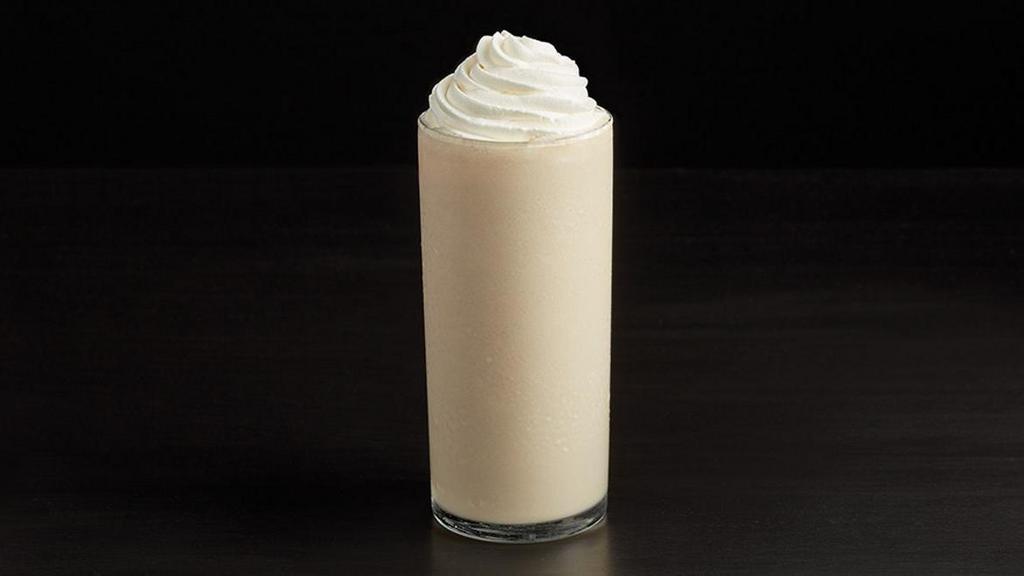 Coffee-Free Vanilla Frappé · Refreshing flavor for adults and kids alike. Madagascar Vanilla syrup is blended with cold milk and ice, then topped with a cloud of whipped cream.