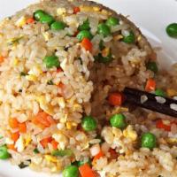 Vegan Mixed Veggie Fried Rice · Mixed vegetables with long grain rice.