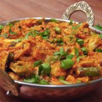 Vegan Mixed Vegetable Jalfrezi · Semi dry dish with blend of vegetables, indian spices, onion, bell pepper and cashew nuts.