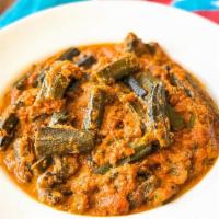 Vegan Bhindi Masala (Okra) · Okra sauteed with onion, vegetarian masala sauce, and tomato base.