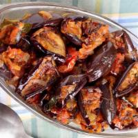 Vegan Baingan Achari (Eggplant) · Roasted eggplant slices cooked in a tomato sauce with infused pickling South Asian spicy ach...