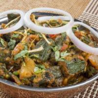 Bhindi Do Pyaza (16 Oz) · Fresh okra stirs fried with onion and tomatoes with a touch of spices.