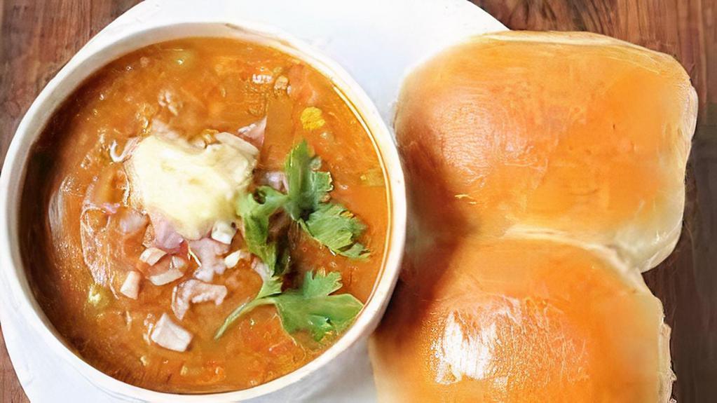 Mumbai pav bhaji · pav bhaji is popular indian street food that consist of thick mashed vegetables curries simmered in butter and served with soft bread roll