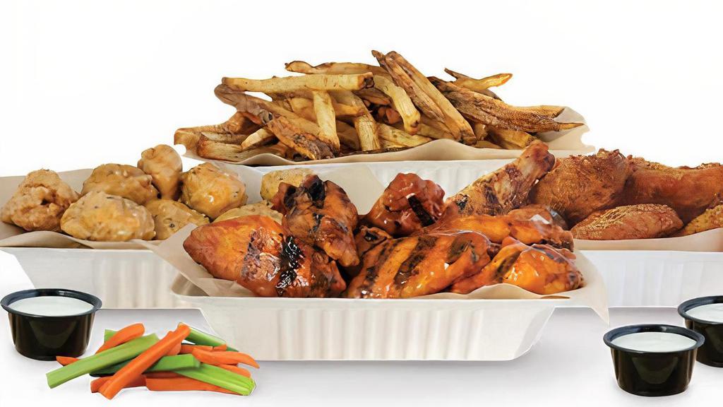 30 Piece Pack · 30 Pit-Smoked Bone-In or Traditional Boneless Wings with choice of up to 3 sauces, 1 large side, veggie sticks and 3 dips