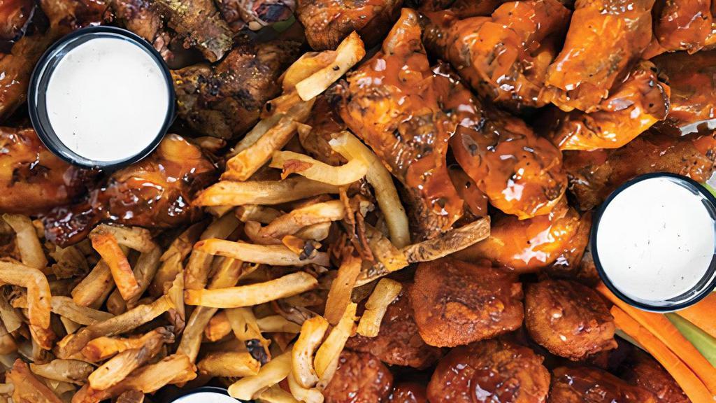100 Piece Pack · 100 Pit-Smoked Bone-In or Traditional Boneless Wings with choice of up to 5 sauces, 4 large sides, veggie sticks and 8 dips
