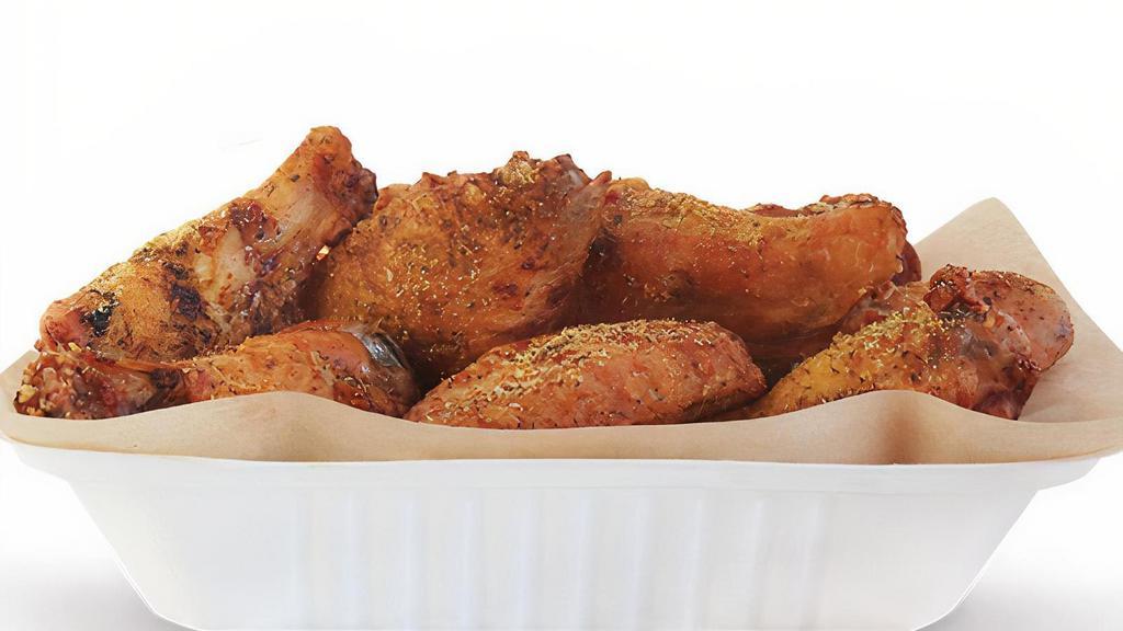 20 Wings · 20 Pit-Smoked Bone-In or traditional Boneless wings with up to 3 sauces *Dips & Veggie Sticks not Included*