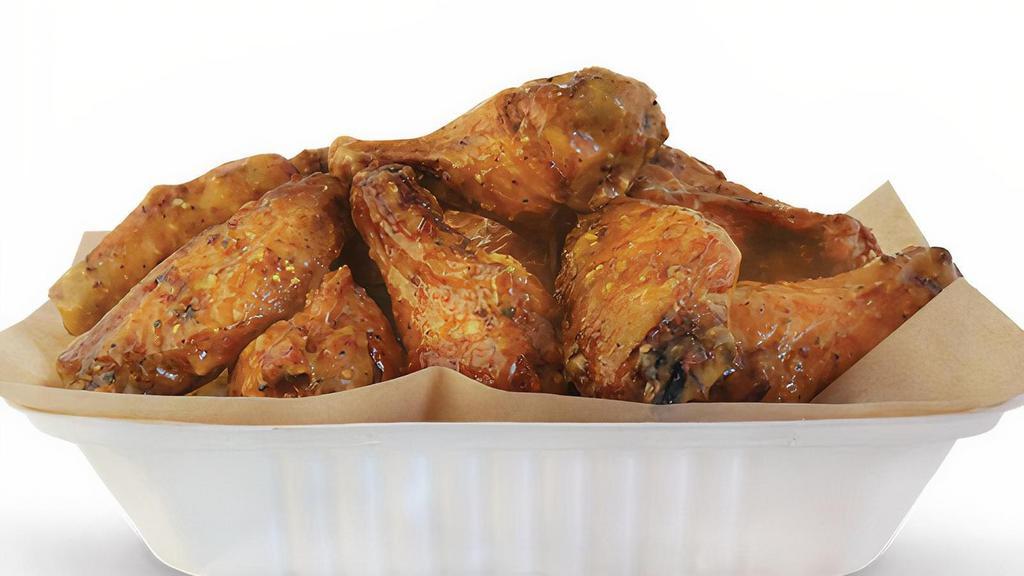15 Wings · 15 Pit-Smoked Bone-In or traditional Boneless wings with up to 2 sauces *Dips & Veggie Sticks not Included*