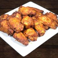 Chipotle Wings - BONE-IN 🌶️🌶️🌶️ · Oven roasted wings. These meaty wings are coated in a hot and spicy chipotle sauce. Served w...