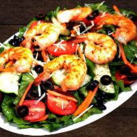 Jumbo Prawns Salad · Romaine hearts lettuce, tomatoes, olives, cucumbers, carrots, and a sprinkling of parmesan c...