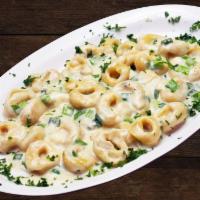 Tortellini Gorgonzola · Cheese Tortellini pasta with your choice of our 100% homemade sauce, tossed with green onion...