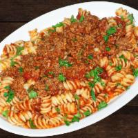 Meaty Sauce Pasta · Rotini pasta with our homemade 100% beef with your choice of our 100% homemade sauce, topped...
