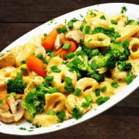 Tortellini Primavera 🍃 · Cheese Tortellini pasta with your choice of our 100% homemade sauce, tossed with broccoli, c...