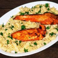 Rotini Chicken Pasta · Rotini pasta with your choice of our 100% homemade sauce, grilled chicken and topped with fi...