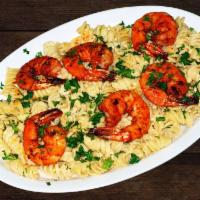 Jumbo Prawns Rotini Pasta · Rotini pasta with our homemade sauce, topped with shrimp, Italian seasoning and mozzarella c...