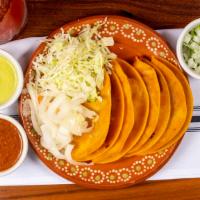 3 Tacos de Carnitas · 