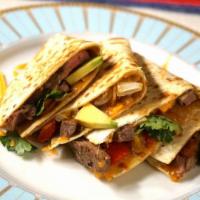 Fajita sonora · Grilled steak or chicken with Monterey Jack, roasted red peppers, grilled onions, soy sauce,...