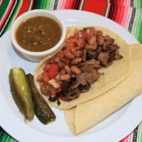 Super Taco · Large Fresh Hand-Made Tortilla, meat, whole beans, Pico de gallo and salsa on the side.