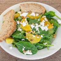 Spinach Salad · Baby spinach, orange, goat cheese, pine nuts, citrus vinaigrette