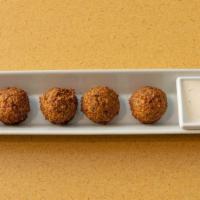 Falafel (5) · Five of our delicious falafels balls made to order. Served with (one) side tahini.