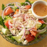 Greek Salad Regular Size · Romaine lettuce, tomatoes, cucumbers, feta cheese, kalamata olives, red onion and seasonings...