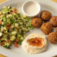 Falafel Plate · Fresh made falafel balls. Served on a plate with hummus, tahini, Israeli salad and one pita ...