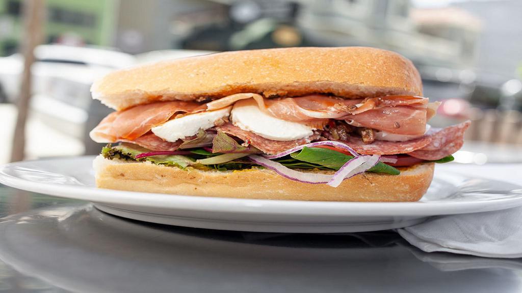 The Special Sandwich · What's good. Prosciutto, hot coppa and salami with fresh mozzarella and olive spread.