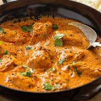 Butter Chicken · Chunks of roasted marinated chicken in a spiced curry sauce.