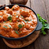 Chicken Curry · Indian-style curry made with boneless chicken marinated in chef's sauce in mild spices. Serv...