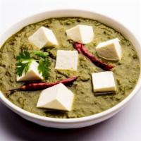 Saag Paneer Curry · Indian marinated cheese in a fresh green spinach curry. Served with basmati rice.