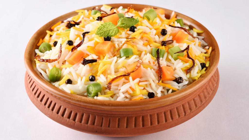 Paneer Biryani · Basmati rice marined with Indian spices, Indian cheese, and locally grown seasonal vegetables.
