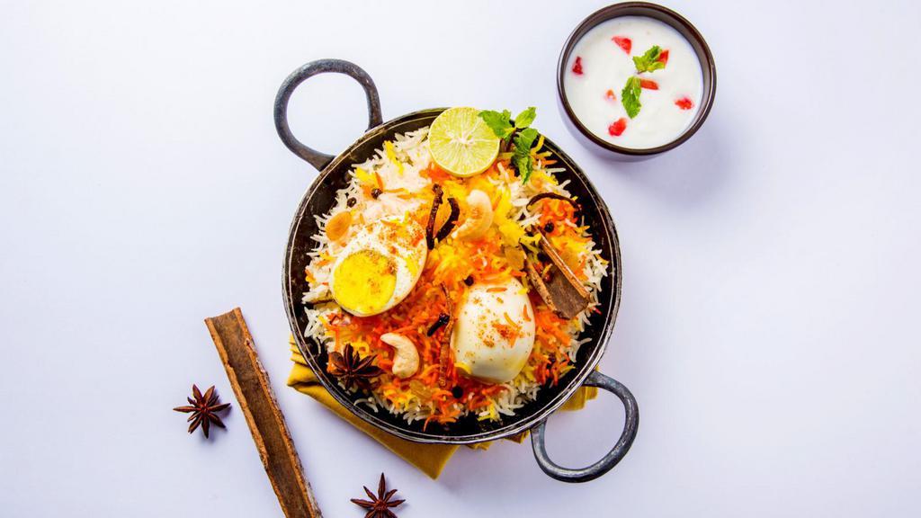 Egg Biryani · Basmati rice marined with Indian spices, fresh eggs, and locally grown seasonal vegetables.