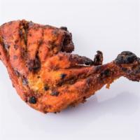 Quarter Chicken Tandoori Leg · Bone-in marinated chicken cooked in the clay oven.