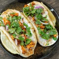 Tandoori Chicken (Naan Tacos) · Two mini garlic naans with tandoori chicken, garlic white sauce, red onions, fresh cilantro ...