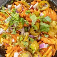 Butter Chicken Fries · Crispy waffle fries w/masala chicken, red onions, jalapenos topped with creamy butter sauce ...