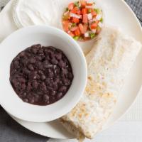 Breakfast Burrito · Vegetarian. Flour tortilla stuffed with scramble eggs, pepper jack cheese, hash browns, and ...