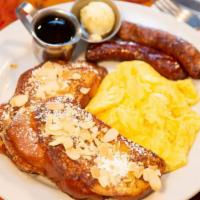 Deuces Wild · Two pancakes or two pieces French toast (has almonds) with two eggs any style and two bacon,...