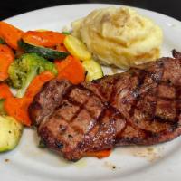 Perfect Day New York Steak · Eight ounce New York steak,  served with mashed potatoes or fries, coleslaw, or garlicky bro...