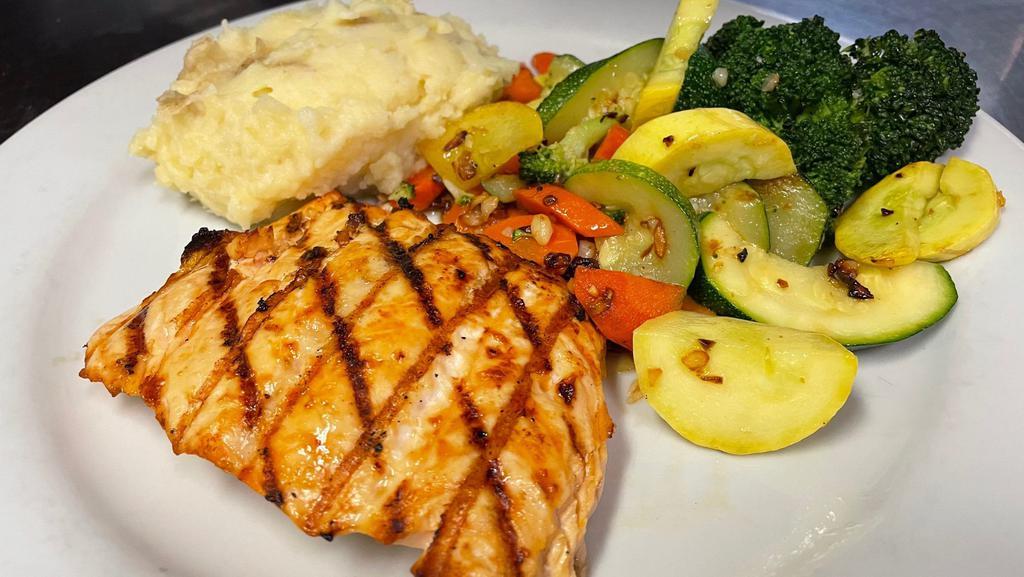 Grilled Salmon · Served with mashed potatoes and garlicky mixed veggies.