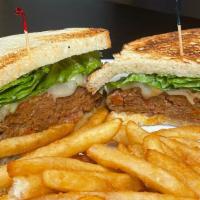 Meatloaf Sandwich · Served on sourdough with pepper jack cheese, mayo, lettuce and choice of side.