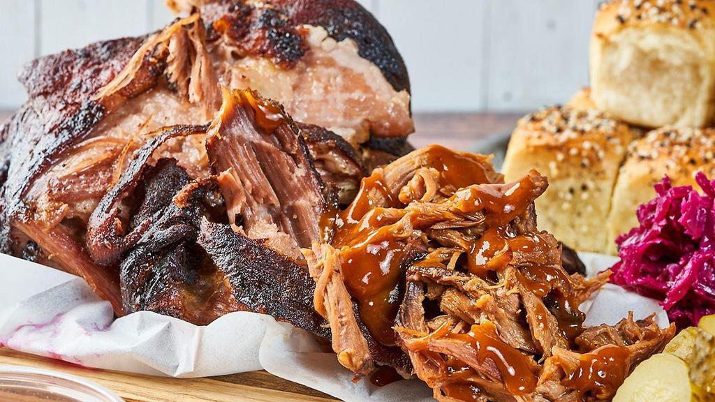 BBQ Pulled Pork by Mac 'n Cue · By Mac 'n Cue by International Smoke. Smoked slowly in our wood smoker and tossed with smokey mama BBQ sauce. We cannot make substitutions.