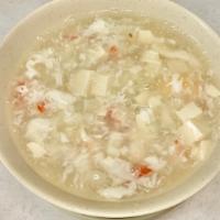 8. Seafood Combination Soup · Shrimp scallops and squid in chicken broth
