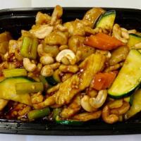 5. Cashew Nut Chicken · Sliced chicken breast sautéed with celery carrot zucchini and water chestnut cooked with gol...