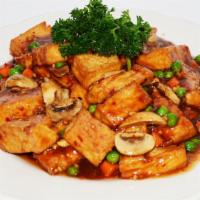 6. Ma Po to Fu in Hot Spicy Sauce · Soft tofu sauteed with vegetables, served in spicy sauce.