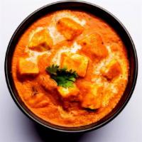 Paneer Butter Masala · Creamy tomato base covered with Indian cheese.