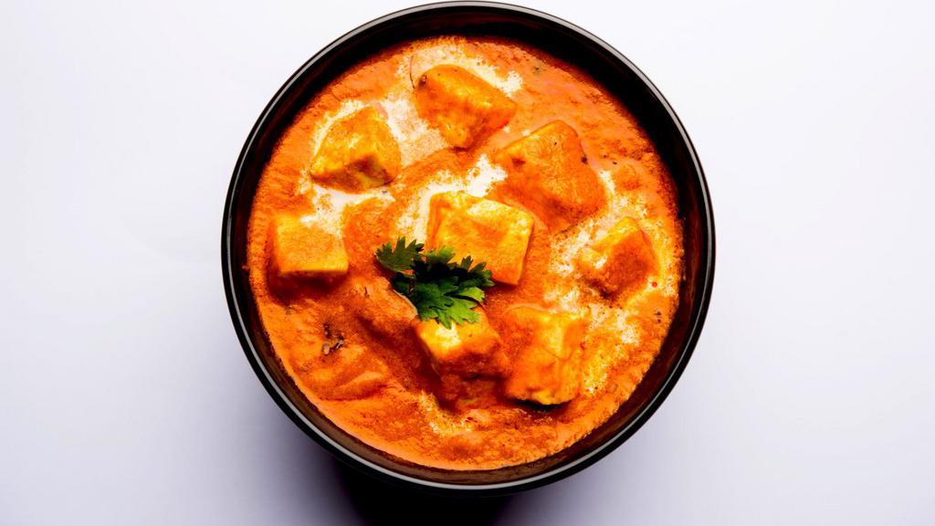 Shahi Paneer Masala · Bhabi's famous! Creamy tomato base covered with Indian cheese.