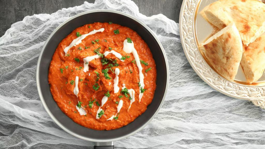 Butter Chicken · Creamy tomato base covered with boneless chicken.