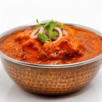 Goat Karahi · Chefs special! Savory lamb in a signature Indian tomato sauce.