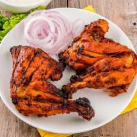 Chicken Tandoori Leg · Bone-in pieces of marinated chicken cooked in the clay oven.