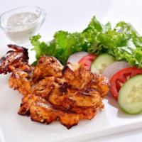 Chicken Boti Kebab · Boneless chicken marinated in yogurt and Indian spices cooked in the clay oven.